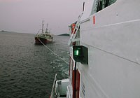 Line passed between two vessels